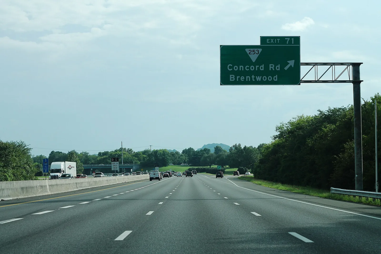 Southbound I-65 approaching Exit 71, the Concord Road (State Route 253) exit in Brentwood