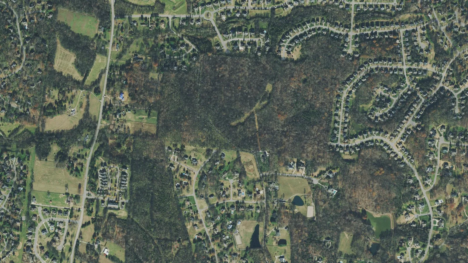 Liberty Church Road, running north to south at left, and the land east of it in Brentwood, seen from the air. The picture does not mark the subdivision's boundaries.