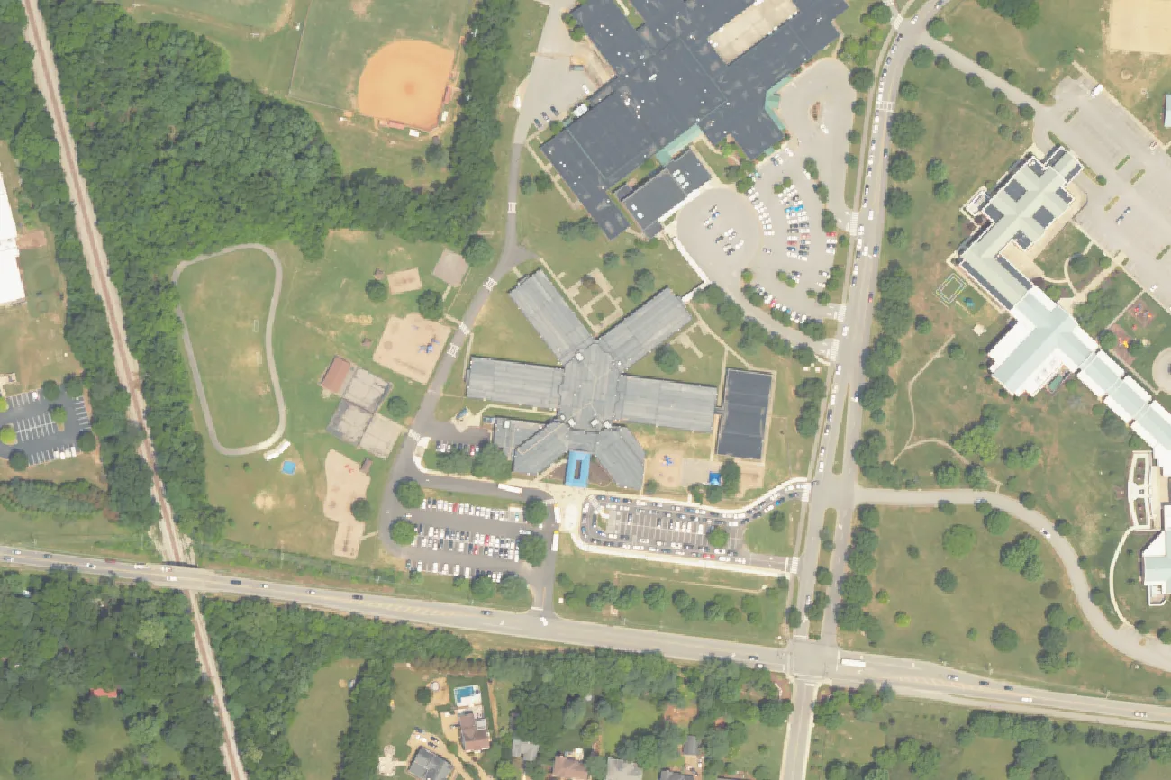 Crockett Elementary School on Crockett Road in Brentwood, with Woodland Middle at the top of the frame, seen from the air