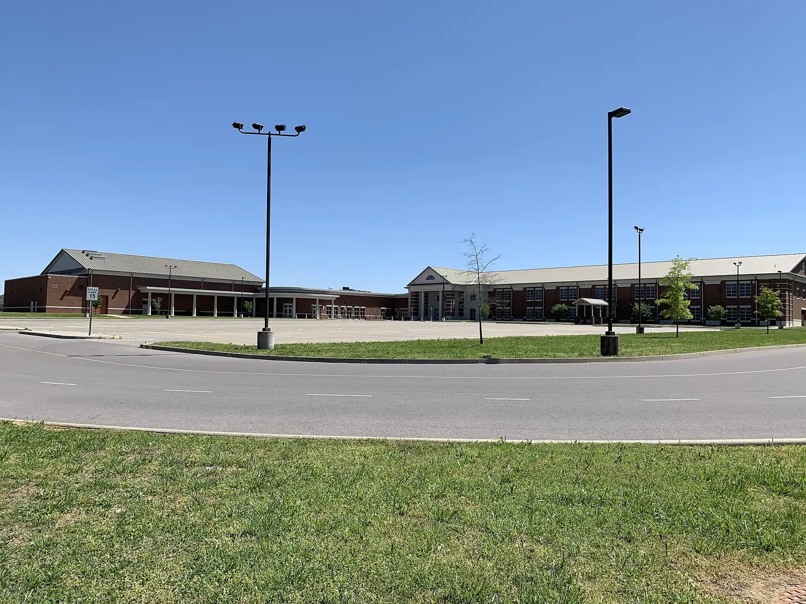 Nolensville High School's rear parking lot and entrance, with the gymnasium at left, on Summerlyn Drive in Nolensville